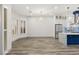 Bright dining area with hardwood floors and modern chandelier at 1613 Shadow Rock Dr, Las Vegas, NV 89117