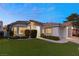 House exterior at dusk showcasing landscaping and two-car garage at 1613 Shadow Rock Dr, Las Vegas, NV 89117