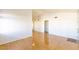 Open living room with hardwood floors and natural light at 1830 N Buffalo Dr # 2095, Las Vegas, NV 89128