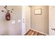 Light and bright condo entryway with wood-look flooring at 2101 Quartz Cliff St # 207, Las Vegas, NV 89117