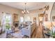 Bright and airy living room with gray sofas and high ceilings at 2101 Quartz Cliff St # 207, Las Vegas, NV 89117