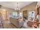 Cozy living room with gray couches and wood flooring at 2101 Quartz Cliff St # 207, Las Vegas, NV 89117