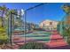 Outdoor community sports court with basketball hoop and tennis court at 2101 Quartz Cliff St # 207, Las Vegas, NV 89117