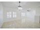 Bright dining room with tile floors and large windows at 2120 Waterlily View St, Henderson, NV 89044