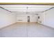 Garage with overhead storage and epoxy flooring at 2120 Waterlily View St, Henderson, NV 89044