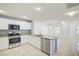 Spacious kitchen with an island and stainless steel appliances at 2120 Waterlily View St, Henderson, NV 89044