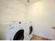 Bright laundry room with washer and dryer at 2120 Waterlily View St, Henderson, NV 89044