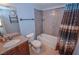 Bathroom with granite countertop, tub, and shower at 2451 N Rainbow Blvd # 2144, Las Vegas, NV 89108