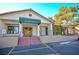 Alondra building entrance with green awning and stairs at 2451 N Rainbow Blvd # 2144, Las Vegas, NV 89108