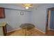 Bright dining area with an octagonal glass table, suitable for small meals at 2451 N Rainbow Blvd # 2144, Las Vegas, NV 89108