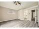 Bright bedroom featuring an ensuite bathroom and modern finishes at 2668 Alwoodley Cir, Las Vegas, NV 89142