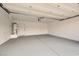 Spacious garage with epoxy floors and a utility sink at 2668 Alwoodley Cir, Las Vegas, NV 89142