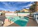 Backyard pool with patio area surrounded by desert landscaping at 2668 Alwoodley Cir, Las Vegas, NV 89142