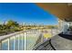 Spacious balcony overlooking tennis courts and pool at 3111 Bel Air Dr # 4G, Las Vegas, NV 89109