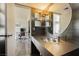 Contemporary bathroom featuring a sleek sink and large mirror at 3111 Bel Air Dr # 4G, Las Vegas, NV 89109