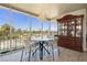 Dining area with city views and a wooden hutch at 3111 Bel Air Dr # 4G, Las Vegas, NV 89109