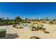 Resort-style pool and patio area with city views at 3111 Bel Air Dr # 4G, Las Vegas, NV 89109