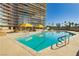 Inviting swimming pool with surrounding patio at 3111 Bel Air Dr # 4G, Las Vegas, NV 89109