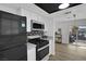 Kitchen with stainless steel appliances and light wood flooring at 3883 Seedling Way, Las Vegas, NV 89115