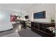 Open living space with built-in shelving and dark floors at 4381 W Flamingo Rd # 5103, Las Vegas, NV 89103