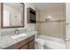 Bathroom with granite vanity and shower/tub combo at 4775 Summerhill Rd, Las Vegas, NV 89121