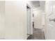 Bright hallway with wood-look floors and access to bedrooms at 4775 Summerhill Rd, Las Vegas, NV 89121