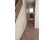 Interior hallway with carpet and access to kitchen at 4801 Fiesta Lakes St, Las Vegas, NV 89130