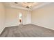 Spacious bedroom with carpet and access to bathroom at 5124 Pensier St, Las Vegas, NV 89135