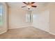 Well-lit bedroom with double door closet and ceiling fan at 5124 Pensier St, Las Vegas, NV 89135