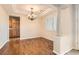 Elegant dining room with hardwood floors and a chandelier at 5124 Pensier St, Las Vegas, NV 89135