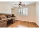 Home office with hardwood floors and built-in desk at 5124 Pensier St, Las Vegas, NV 89135