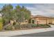 One-story house with desert landscaping and two-car garage at 5124 Pensier St, Las Vegas, NV 89135