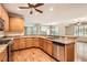 Modern kitchen with granite countertops and stainless steel appliances at 5124 Pensier St, Las Vegas, NV 89135