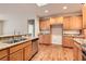 Modern kitchen with granite countertops and stainless steel appliances at 5124 Pensier St, Las Vegas, NV 89135