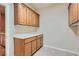 Laundry room with built-in cabinets and counter space at 5124 Pensier St, Las Vegas, NV 89135