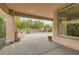 Covered patio with built-in grill and view of backyard at 5124 Pensier St, Las Vegas, NV 89135