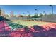 Well-maintained tennis court with lighting and fencing at 5124 Pensier St, Las Vegas, NV 89135