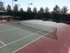 Community tennis courts with nets and well-maintained surfaces at 5124 Pensier St, Las Vegas, NV 89135