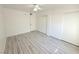 Spacious bedroom featuring wood-look floors and ample closet space at 5222 Mandalay Springs Dr # 202, Las Vegas, NV 89120