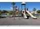 Community playground with slides and climbing structures at 6040 Emma Bay Ct # 101, North Las Vegas, NV 89031