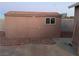 Tan colored storage shed in the backyard at 609 W Victory Rd, Henderson, NV 89015