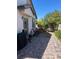 Backyard patio with seating area and grill at 6306 Orions Belt Peak St, North Las Vegas, NV 89031