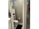 Small bathroom with toilet and cabinet at 6306 Orions Belt Peak St, North Las Vegas, NV 89031