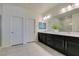 Large bathroom with double vanity and walk-in shower at 752 Drammatico Pl, Henderson, NV 89011