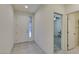 Bright entryway with tile flooring and stained-glass window at 752 Drammatico Pl, Henderson, NV 89011