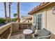 Relaxing balcony with patio furniture and stunning views at 9542 Gainey Ranch Ave, Las Vegas, NV 89147