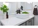 Elegant bathroom featuring a white vessel sink and gray vanity at 9542 Gainey Ranch Ave, Las Vegas, NV 89147