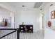 Upstairs hallway with modern flooring and built-in shelving at 9542 Gainey Ranch Ave, Las Vegas, NV 89147