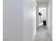 Bright hallway with light grey flooring at 9542 Gainey Ranch Ave, Las Vegas, NV 89147