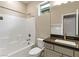 Clean bathroom with a tub, toilet and vanity at 9911 Spinel Pl, Las Vegas, NV 89143